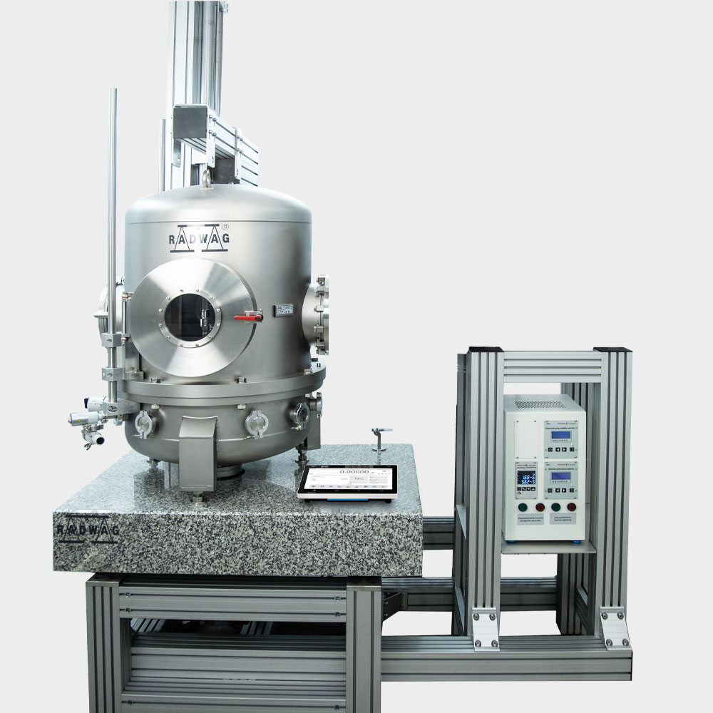 AVK 1000.5Y.LLS Automatic Vacuum Mass Comparator equipped with pumps and Load-Lock System